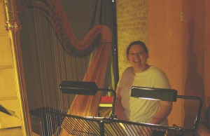 Harpist Catherine Thomas after performing Kate's Immortal Words of Sappho